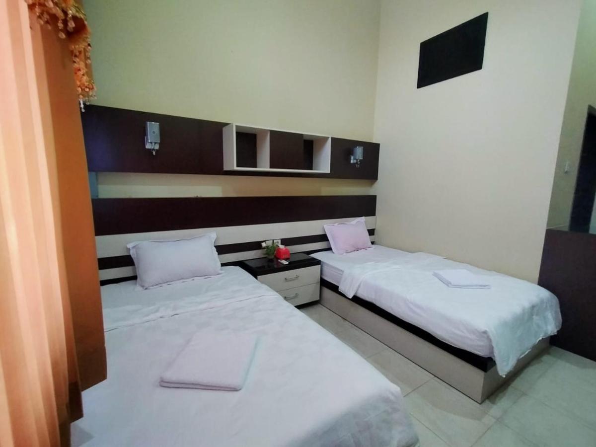 Hotel Pilar Mosa Muarawahau Esterno foto